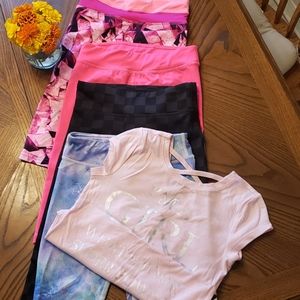 Lot of 4 pairs of workout capris, one w top.